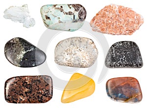 Set of various tumbled stones isolated on white