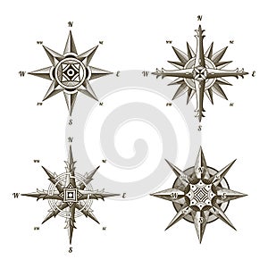 Collection of nautical antique compass signs. Old vector design elements for marine theme and heraldry on white