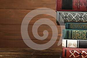 Collection of old books on shelf. Space for text