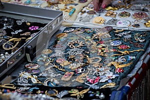 Collection of old brooches at the flee market
