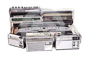 Collection of old tape recorders and transistor radio