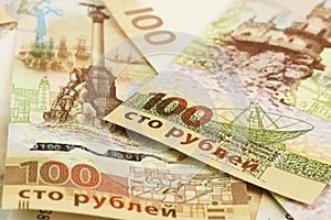 Collection of one hundred Russian rubles memorial banknotes with Crimea symbolics. photo