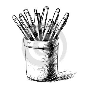 Collection of pens arranged in a cup holder