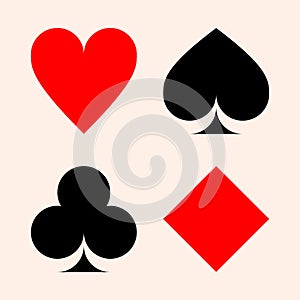 Collection of playing card suits - hearts, clubs, spades, diamonds.