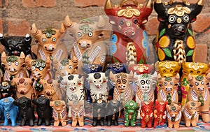 A collection of Pucara Bull statues photo