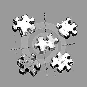 A collection of puzzle pieces scattered across a table, critical thinking, problem-solving photo