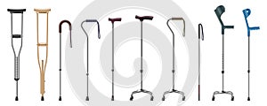 Collection of realistic crutches and walking sticks. Metal and wooden canes, telescopic elbow crutch