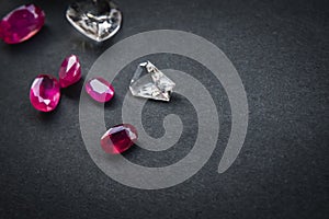 Collection of Red ruby and topaz, Precious stones for jewellery on black matte paper background