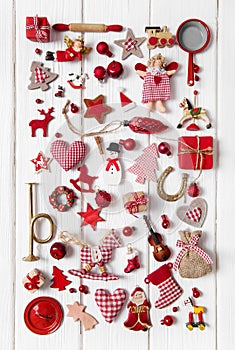 Collection of red and white checkered christmas decoration on wo