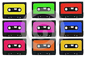 Collection of retro cassete tapes with multicolored stickers iso