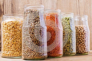 Collection set of beans, pulses, peas, lentils in glass jars