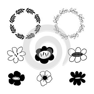 Collection of simple black and white doodle flower designs.