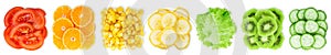 Collection of sliced fruits and vegetables on white