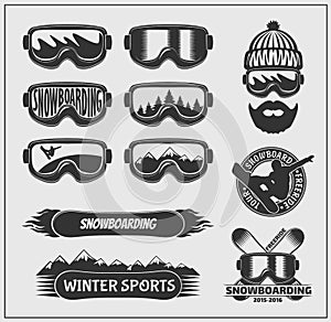 Collection of snowboarding labels, emblems, badges and design elements.
