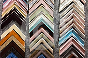 A collection of solid wood photo picture frame corner samples