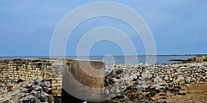 A collection of stones that are useful for resisting high tides and waves