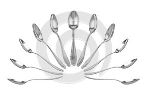 Collection of teaspoons in different perspectives photo
