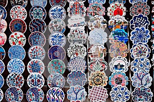 Collection of Traditional Turkish ceramics, decorated plates. Colorful ceramic souvenirs in the old city of Antalya.