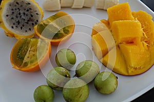 Collection of tropical fruits - Mango, Banana, Dragonfruit, Mammon, Lulo photo