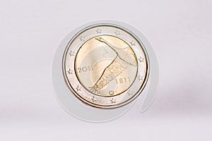 A collection of two euros commemorative coins. In a row, copy space. Concept of numismatic, finance, european currency