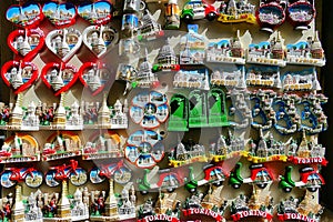 collection of variety of fridge magnets souvenirs on display Turin Italy