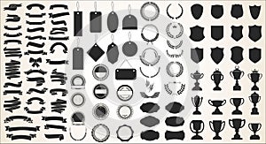 A collection of various black ribbons tags laurels shields and trophies photo