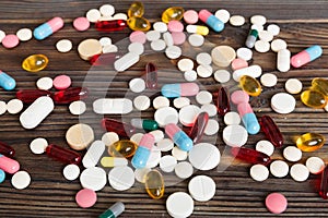 Collection Of Various Medical Tablets And Pills. Assorted pharmaceutical medicine pills, tablets and capsules on table