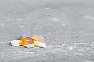 Collection Of Various Medical Tablets And Pills. Assorted pharmaceutical medicine pills, tablets and capsules on table