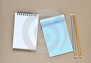 Collection of various note paper and pencils