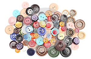 Collection of various sewing buttons on white background