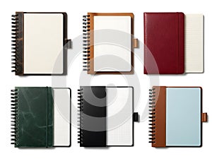 Collection of various spiralbound notebooks in different colors