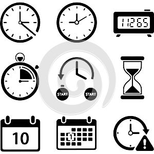 Collection of various types of clocks and timekeeping devices including analog and digital clocks calendar and hourglass