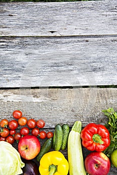 Collection of various vegetables and fruits on rustic wooden background. Copy space. Top view. From above.