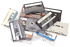 Collection of various vintage audio cassettes tapes, top view.