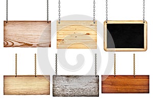 collection of various wooden signs with chain on white background. each one is shot separately