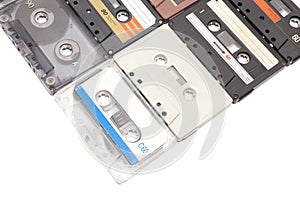 Collection vintage audio cassettes isolated on white.