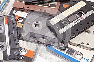 Collection vintage audio cassettes isolated on white.