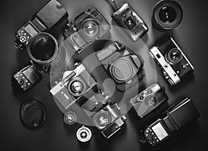 Collection Vintage Film And Digital Cameras, On Black Background, Top View