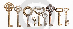 collection of vintage golden keys isolated on white