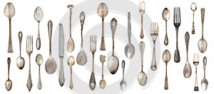 Collection vintage spoons, forks and knife isolated on a white background.