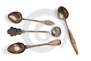 Collection of vintage teaspoons isolated on white background. Top view, flat lay