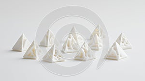 A collection of white, geometric objects arranged in a circular pattern on a white background.