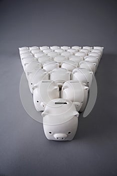 Collection of white piggy banks. Conceptual image