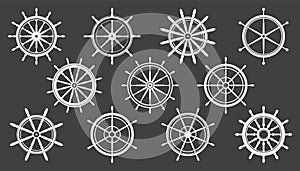 Collection of white vintage steering wheels. Ship, yacht retro wheel symbol. Nautical rudder icon. Marine design element