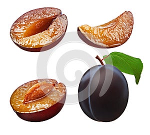 Collection of whole and cut fresh plum fruits on white