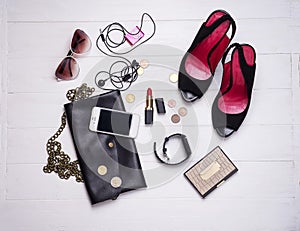 Collection of women`s set of fashion accessories and cosmetics