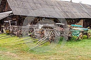 Collection of wooden carts in the Belarusian estate. Belarus, Na