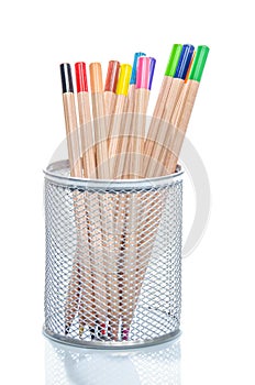 Coloured pencils in a desk tidy