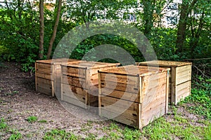 Collective wooden compost bins photo