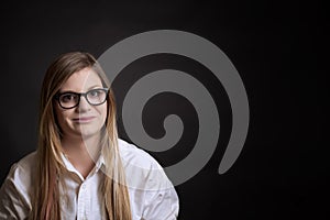 College Student with Blackboard behind her